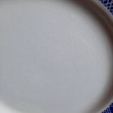 Old mismatched earthenware dinner plates