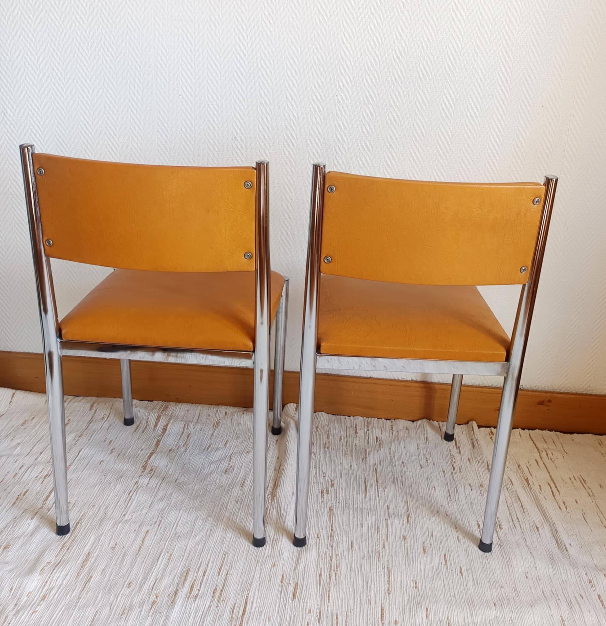 Pair of vintage leatherette and chrome chairs from the 1970s