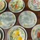 Service 10 plates and 14 sub-plates St Clement