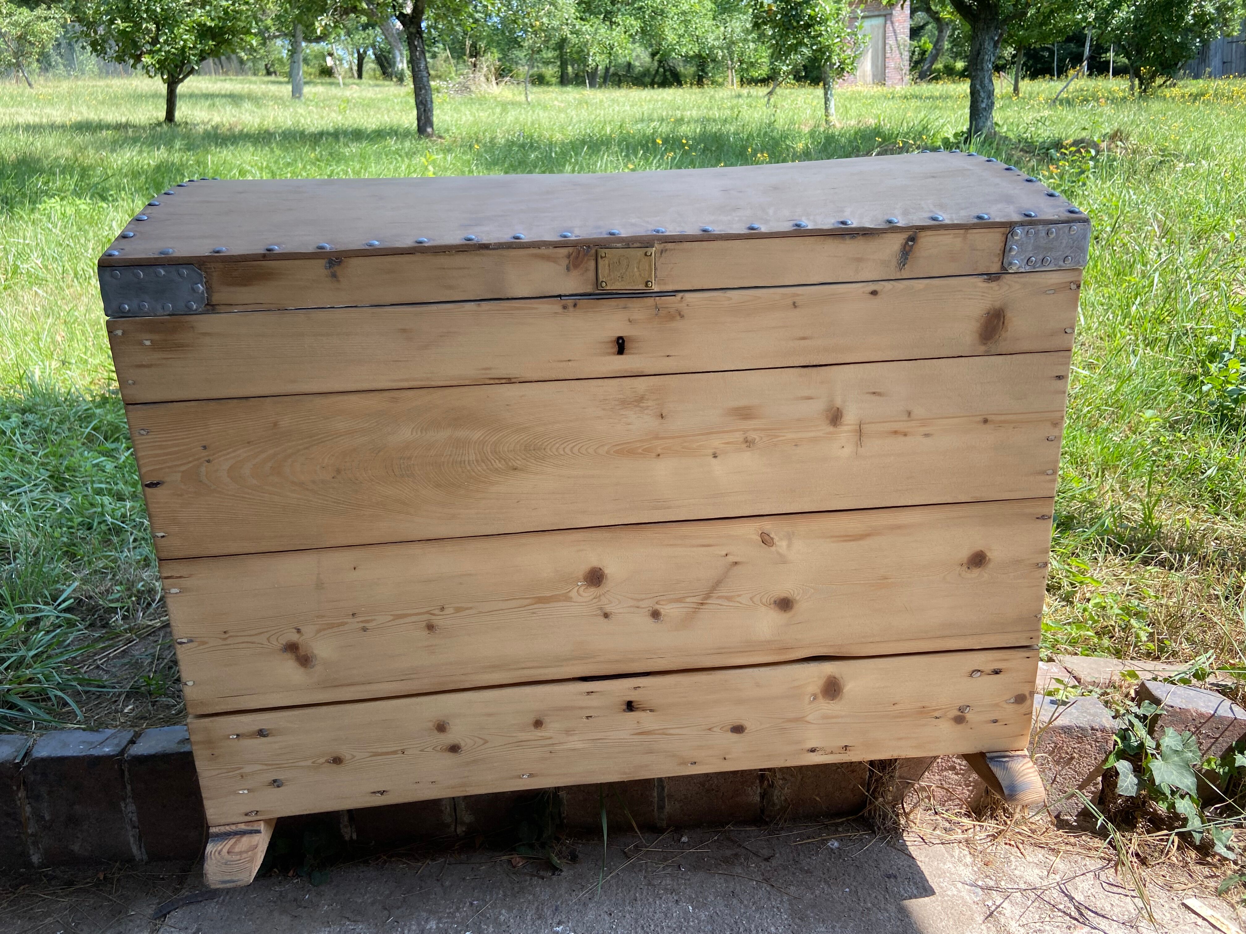 Raw wooden chest with a secret drawer