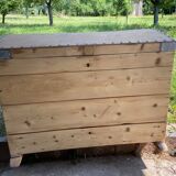 Raw wooden chest with a secret drawer