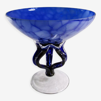 Blue glass cup on foot