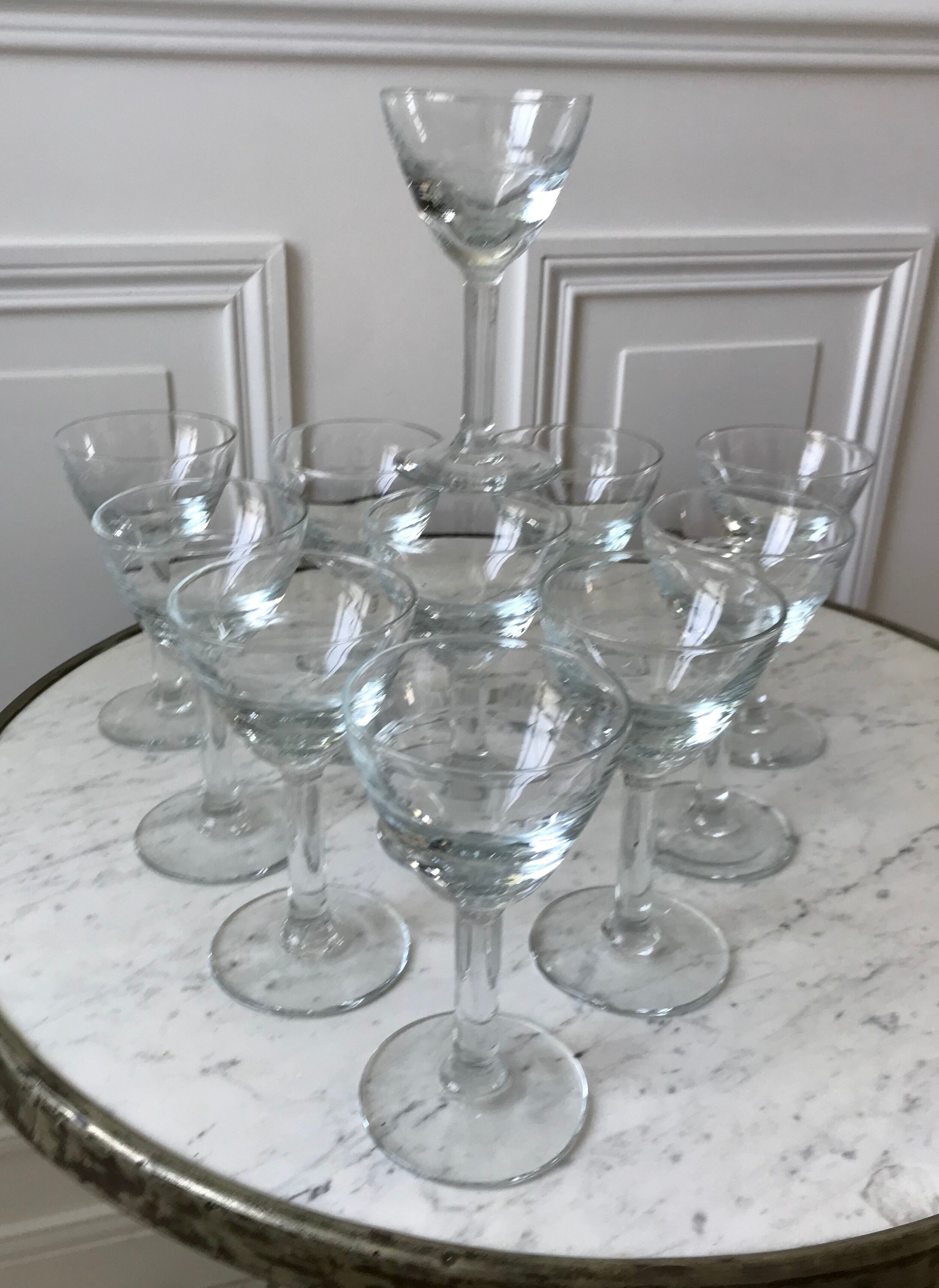 Set of 11 molded glass wine glasses engraved 20s