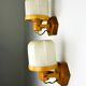 Pair of articulated "Cocoon" wall lights, resin and pine, Italy, circa 1970