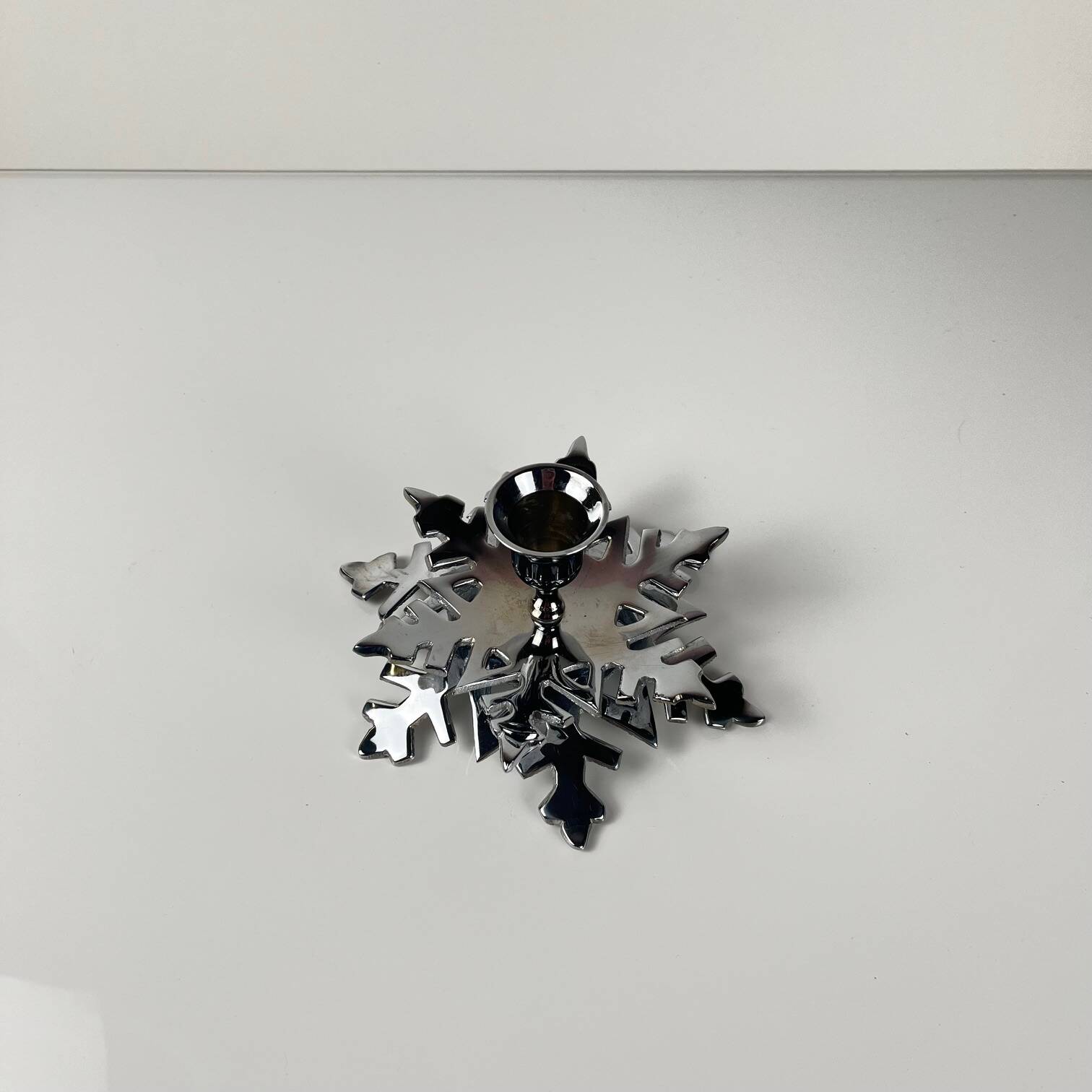 Silver metal snowflake candle holder