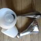 Pair of stainless steel and opaline wall lamps
