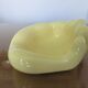 Empty hand-shaped pocket in pale yellow ceramic years70