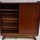Vintage shoe cabinet with tapered legs