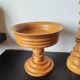 Vintage decor trio: candlestick and light wood bowls in Scandinavian style.