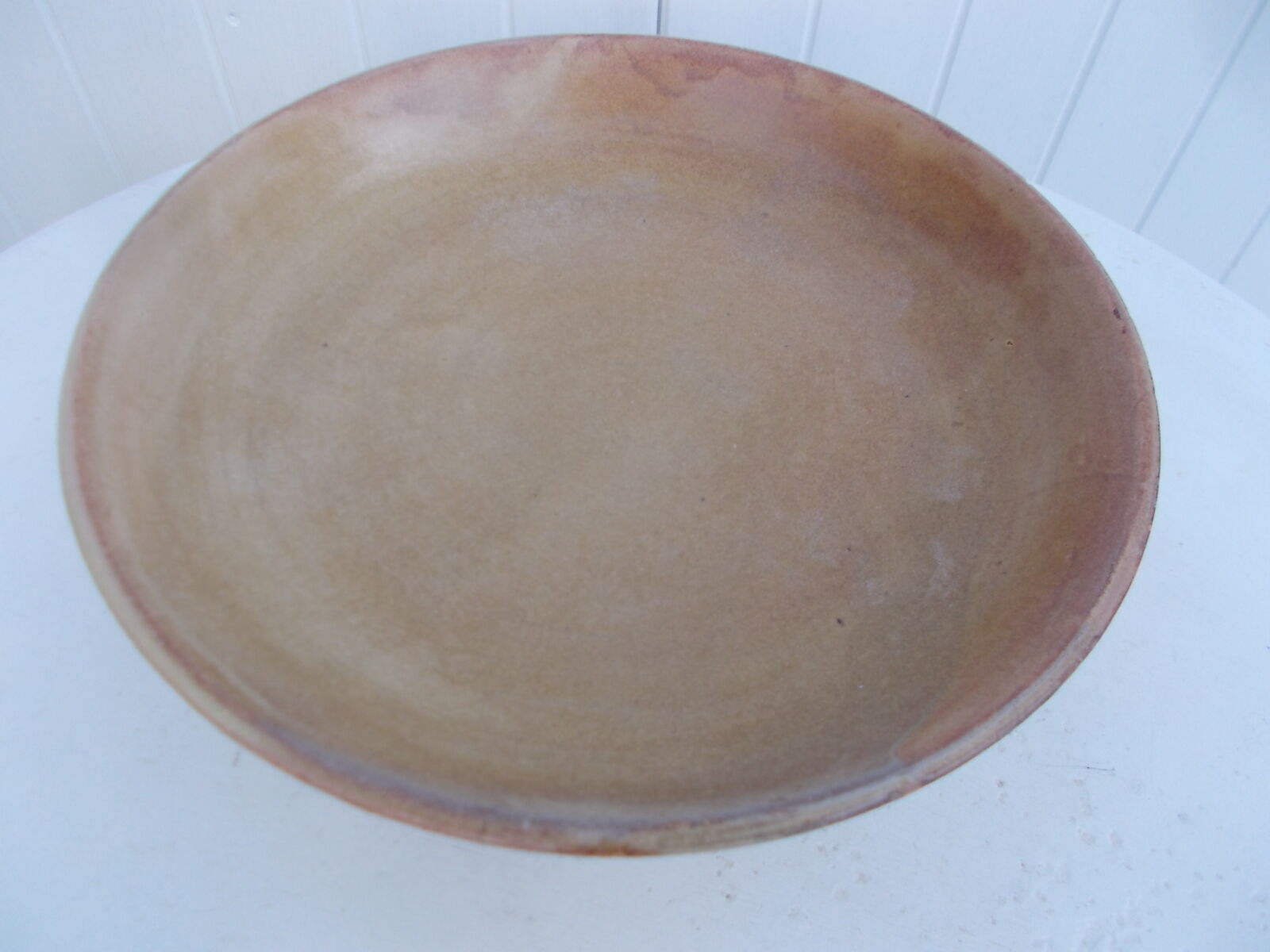 Stoneware serving dish for fruit.