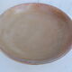Stoneware serving dish for fruit.