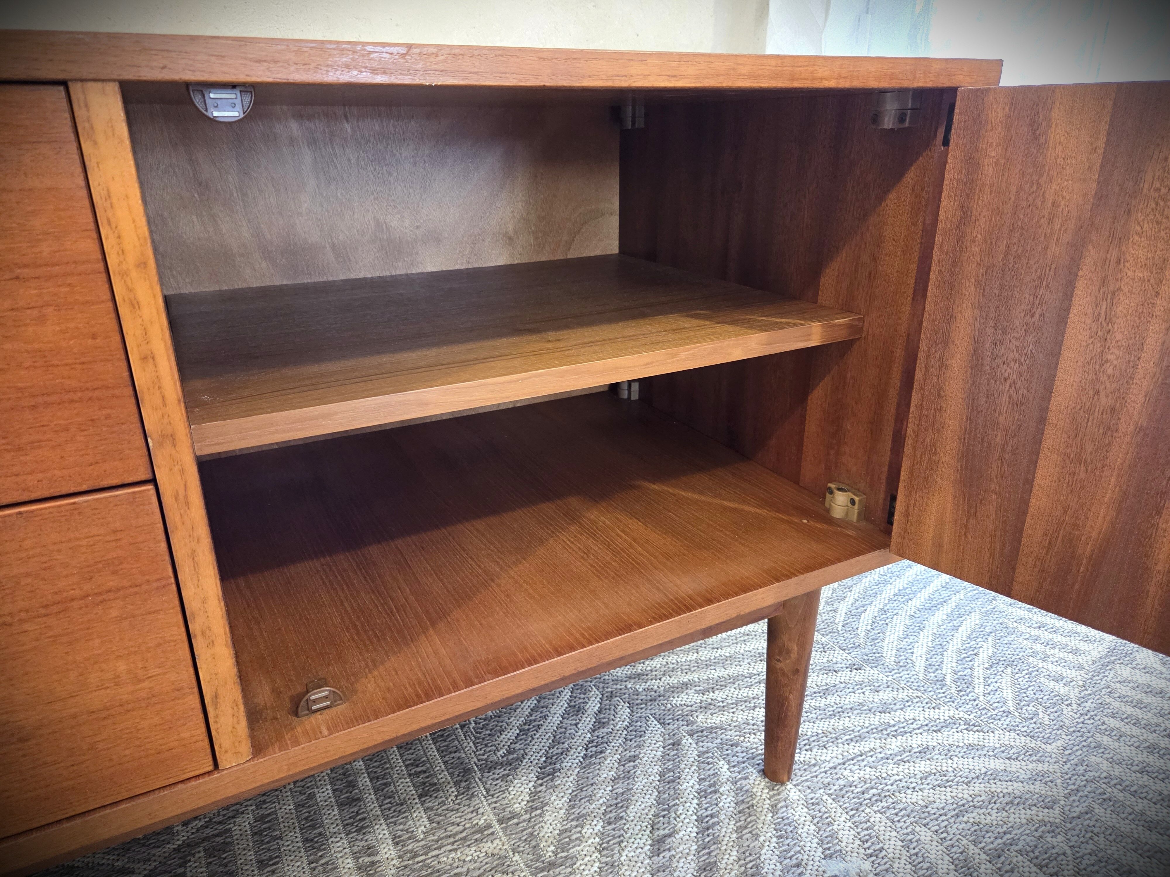 Low Scandinavian enfilade in teak, late 1960s.