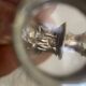 Silver duck sleeve clips, 19th century neck brace