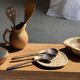 Pair of salad servers or kitchen utensils in blackened teak L30 D9