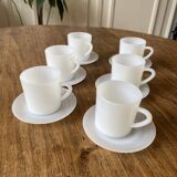 Espresso coffee cup service, Nestlé promotional items, in white glass.