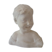 Bust young boy in plaster