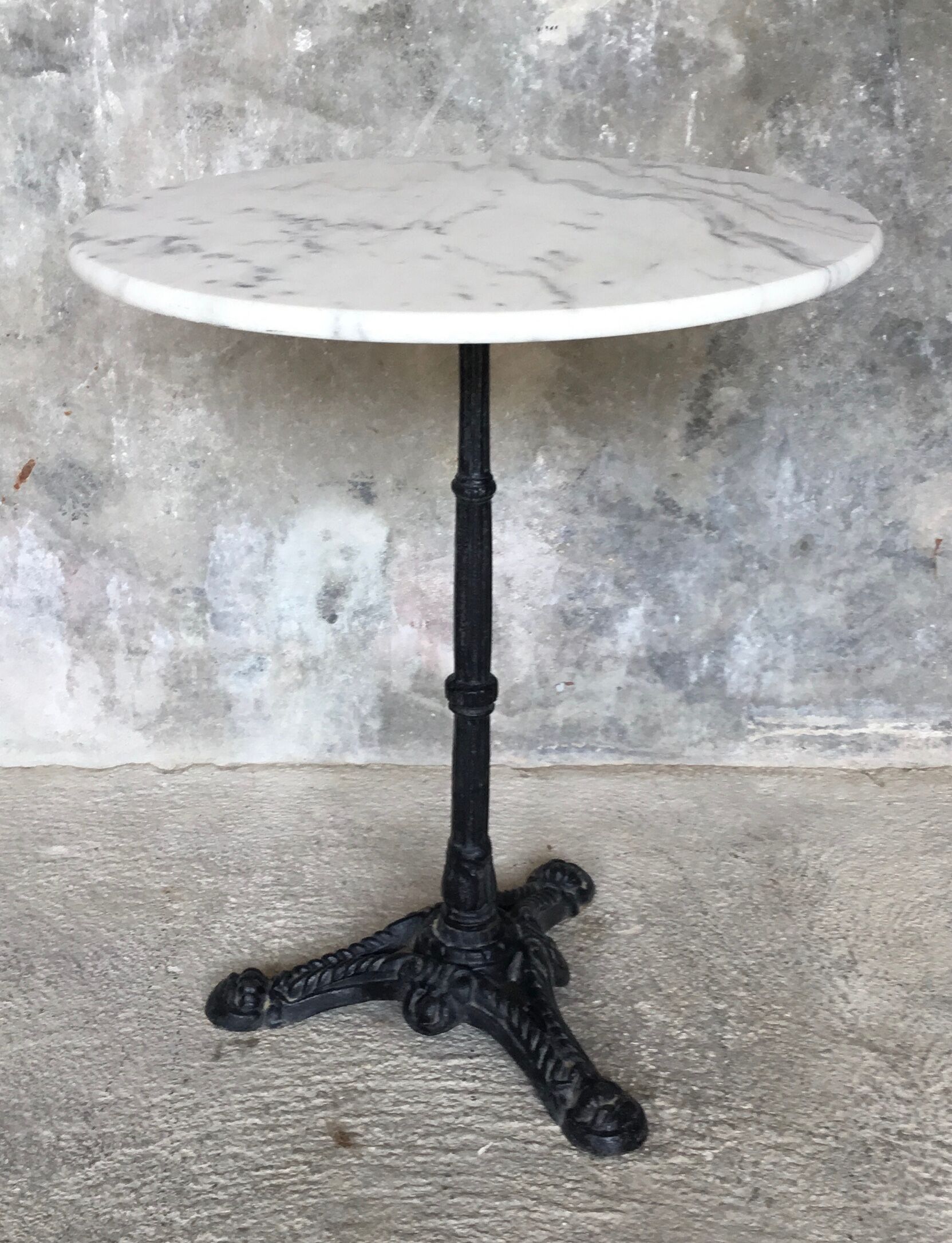 Round marble bistro table and cast iron base