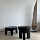 Black mango wood tripod side table with a semi-spherical top, height: 45 cm, diameter: 44 cm.