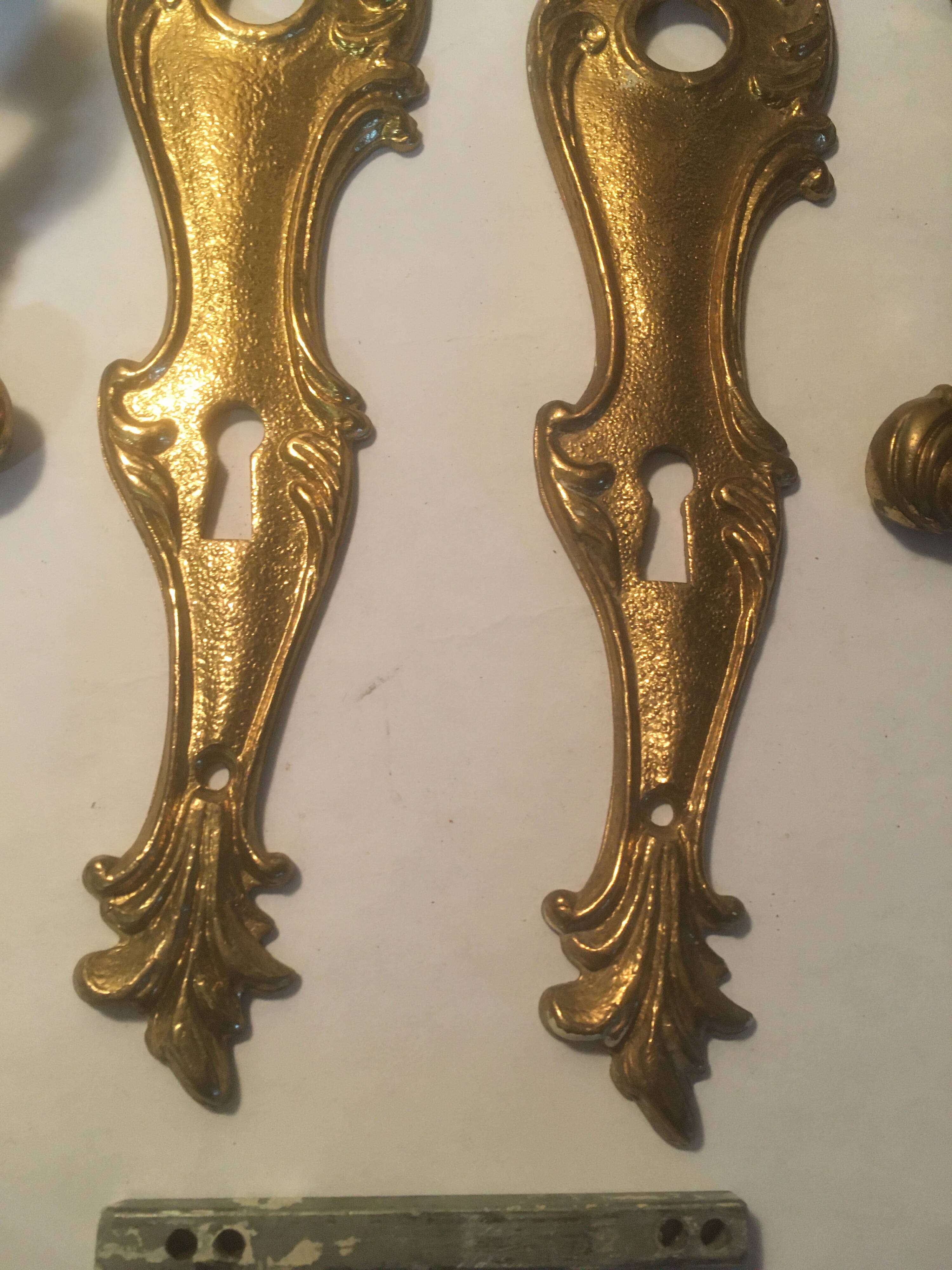 Louis xv style brass crutches and plaques