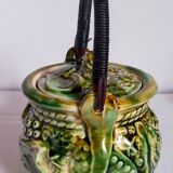 Set of old teapots and honey pot