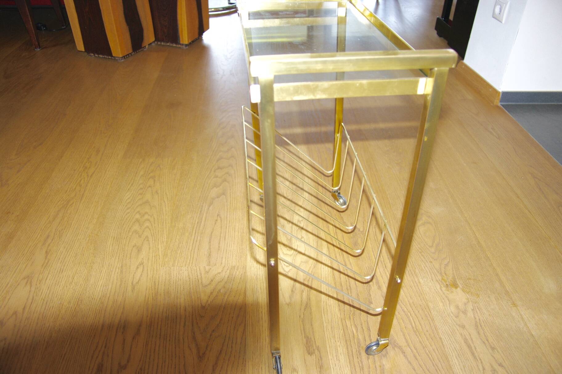 Vintage side table with brass and glass magazine rack