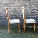 series of 8 vintage skai and wood chairs