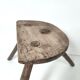 Brutalist tripod stool in solid wood half round