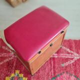 Old fisherman's stool with red seat