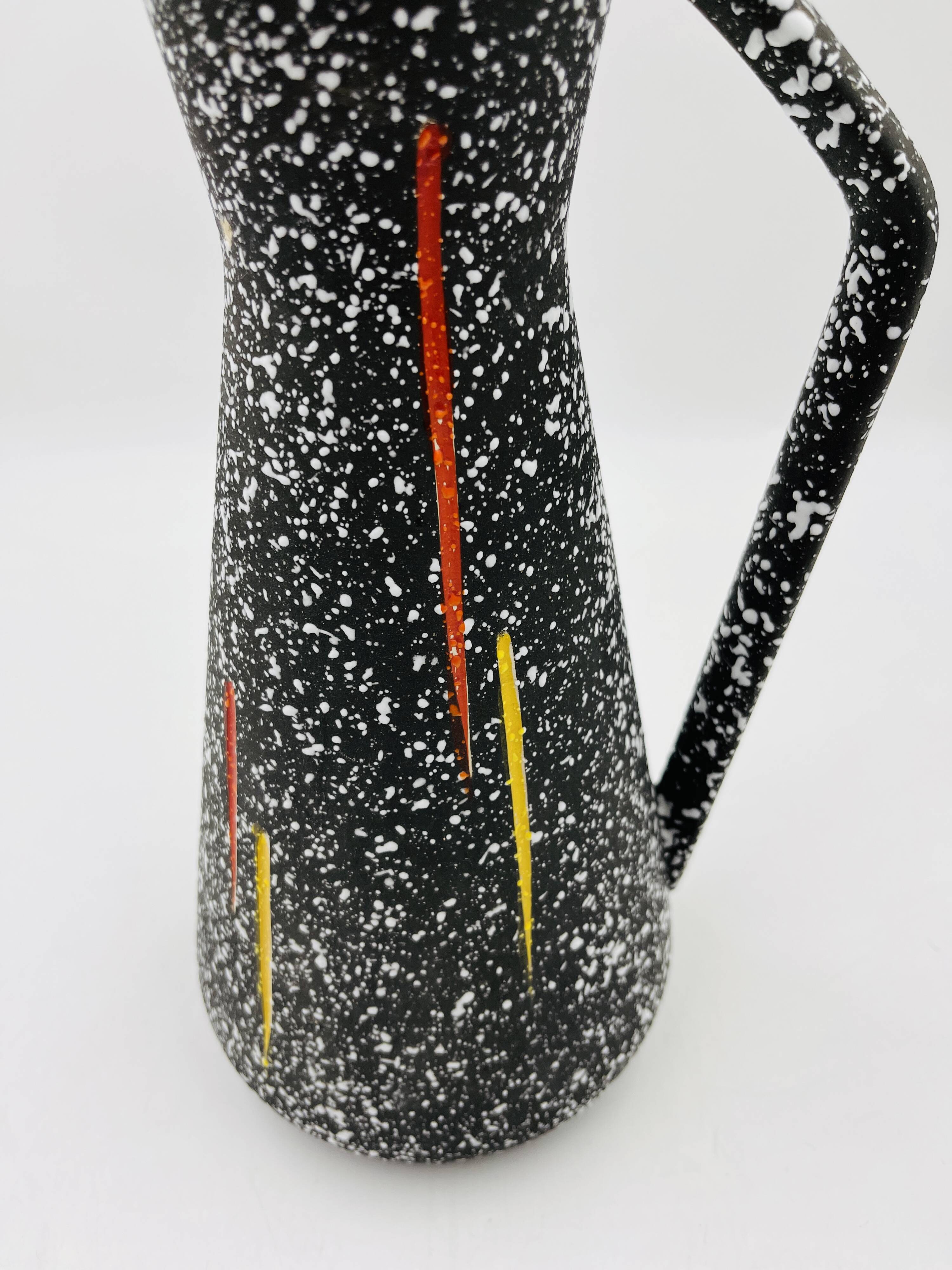 Vintage pitcher Hubert Bequet in speckled ceramic Belgium