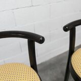 Pair of Baumann Dialog model stools in black and yellow and blue imitation leather, 1990