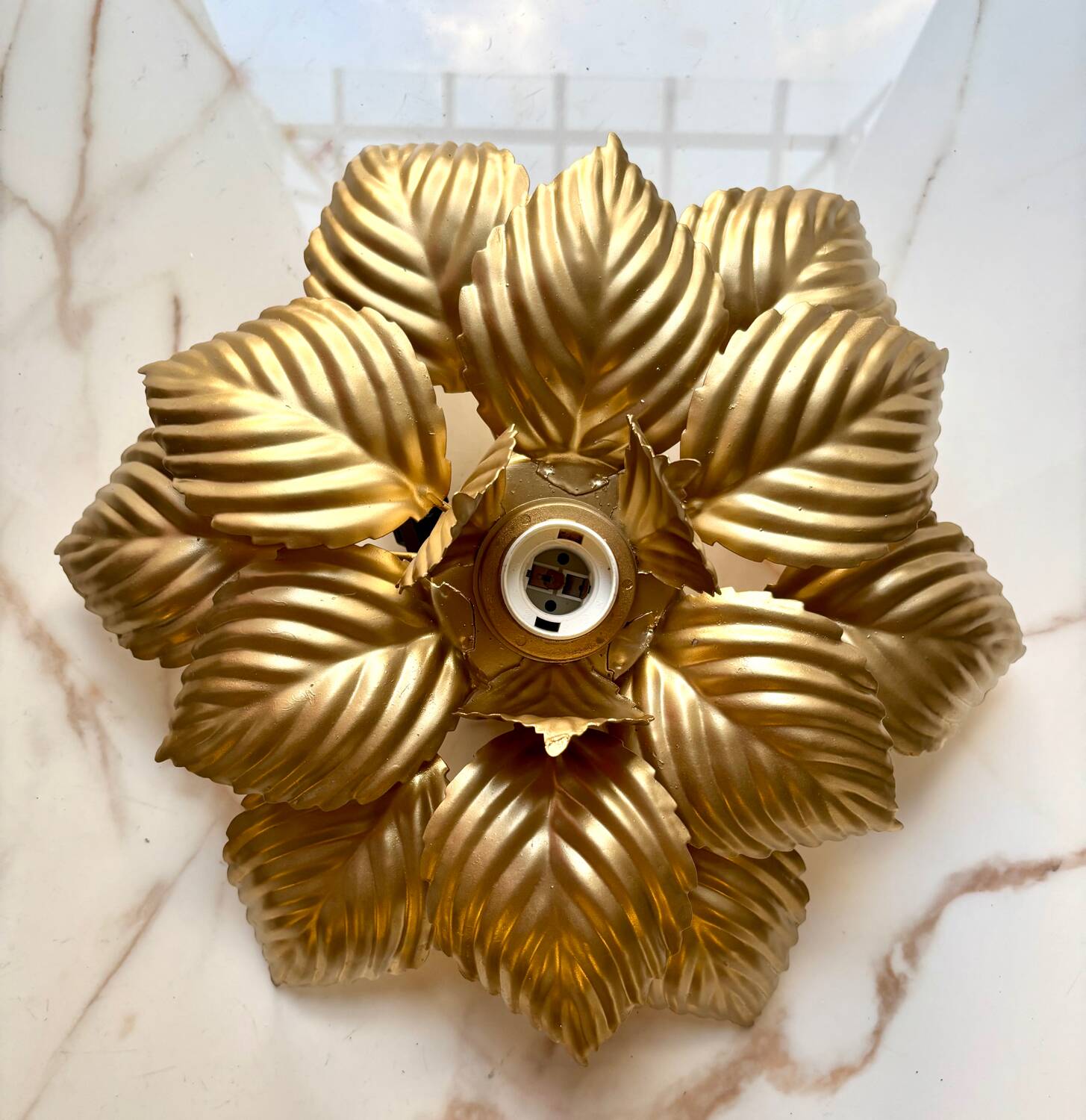 Paire d’appliques fleur dorées