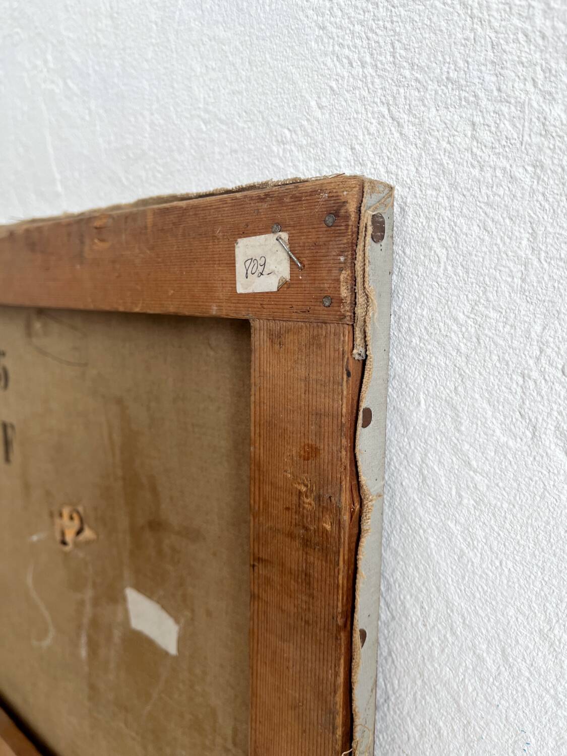 Old oil painting on canvas portrait of a woman in traditional costume