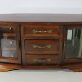 Wooden jewelry box in the shape of a dresser