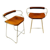 Pair of Hug bar stools in tobacco colour and brass metal.