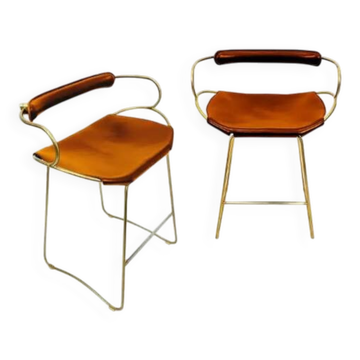 Pair of Hug bar stools in tobacco colour and brass metal.