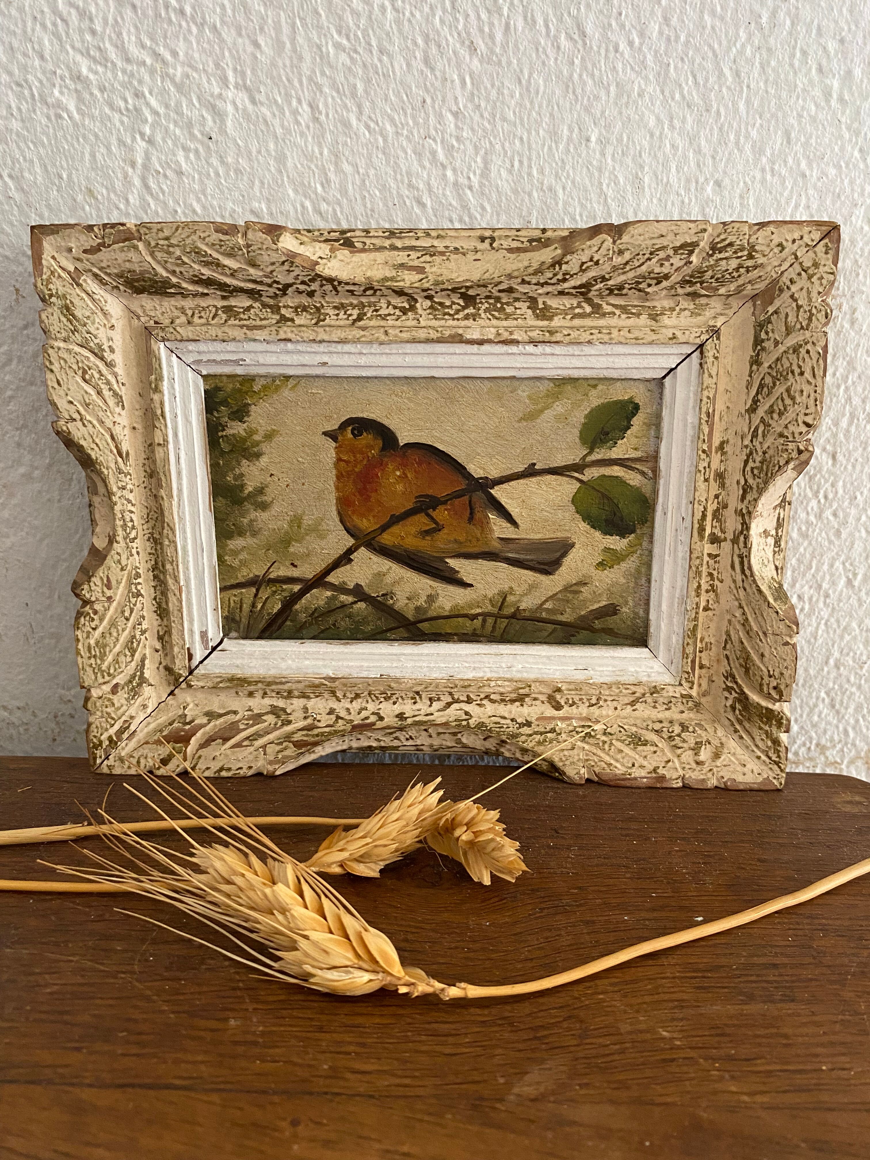 Vintage frame bird painting on a branch