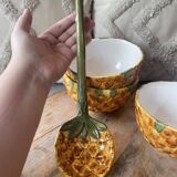 Old set of bowls and spoons in the shape of vintage pineapple