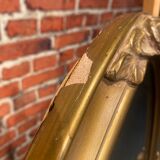 Oval mirror with wooden frame