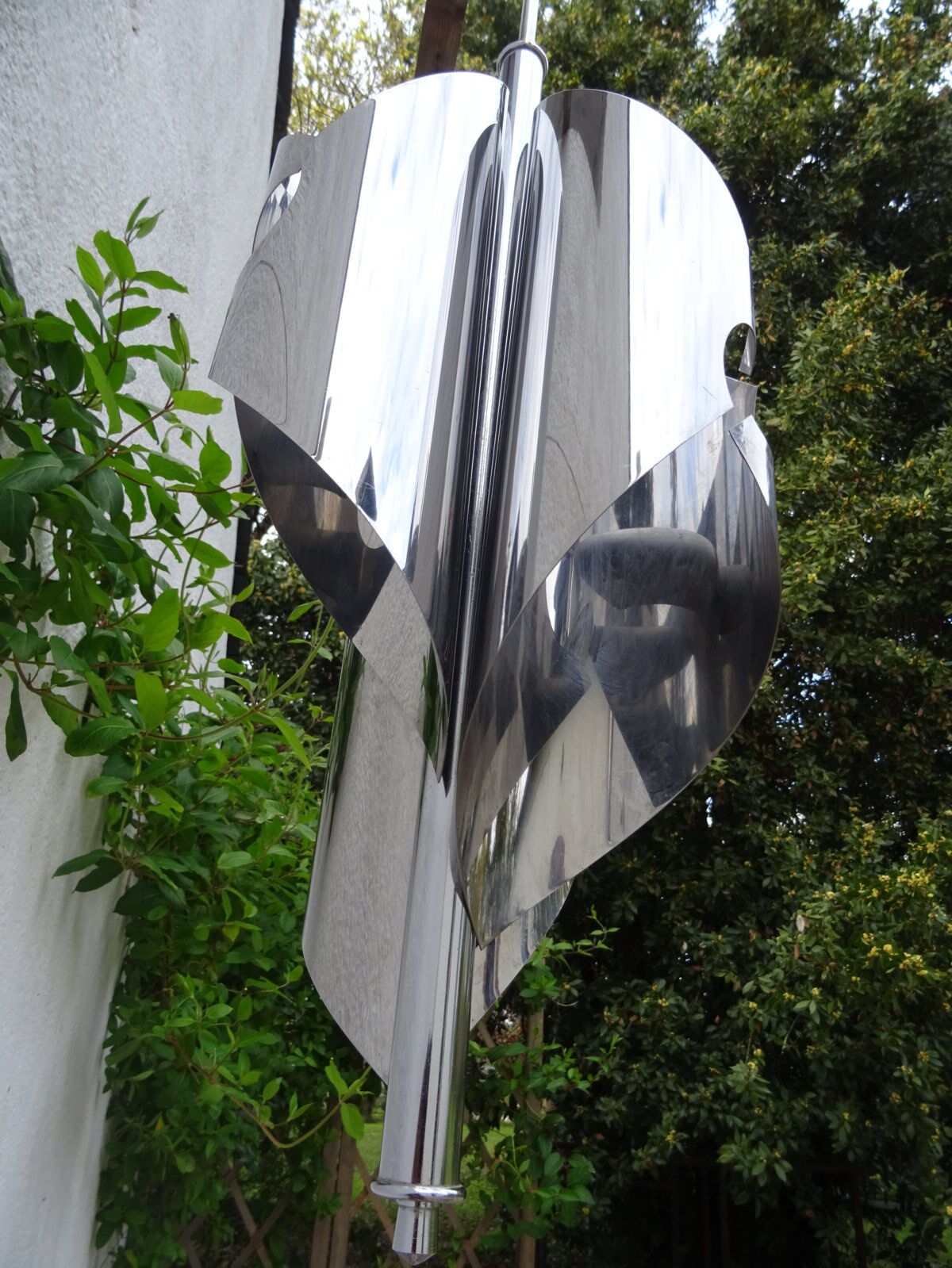 Hanging space age stainless steel