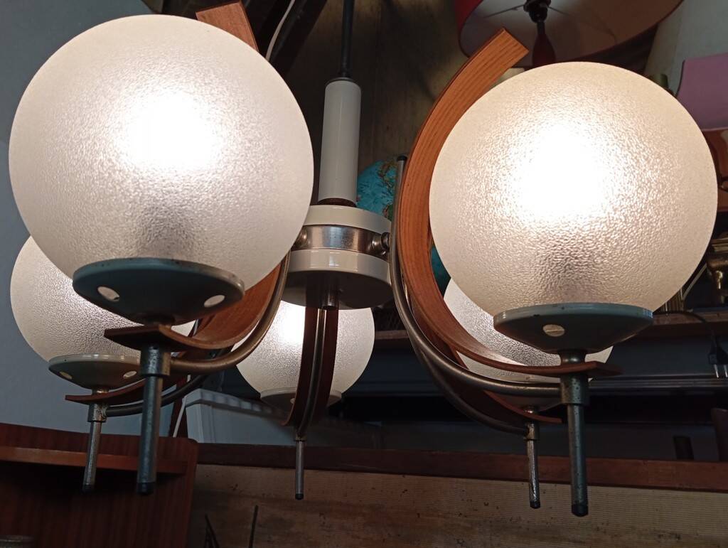 Scandinavian suspension in teak, glass, and metal.