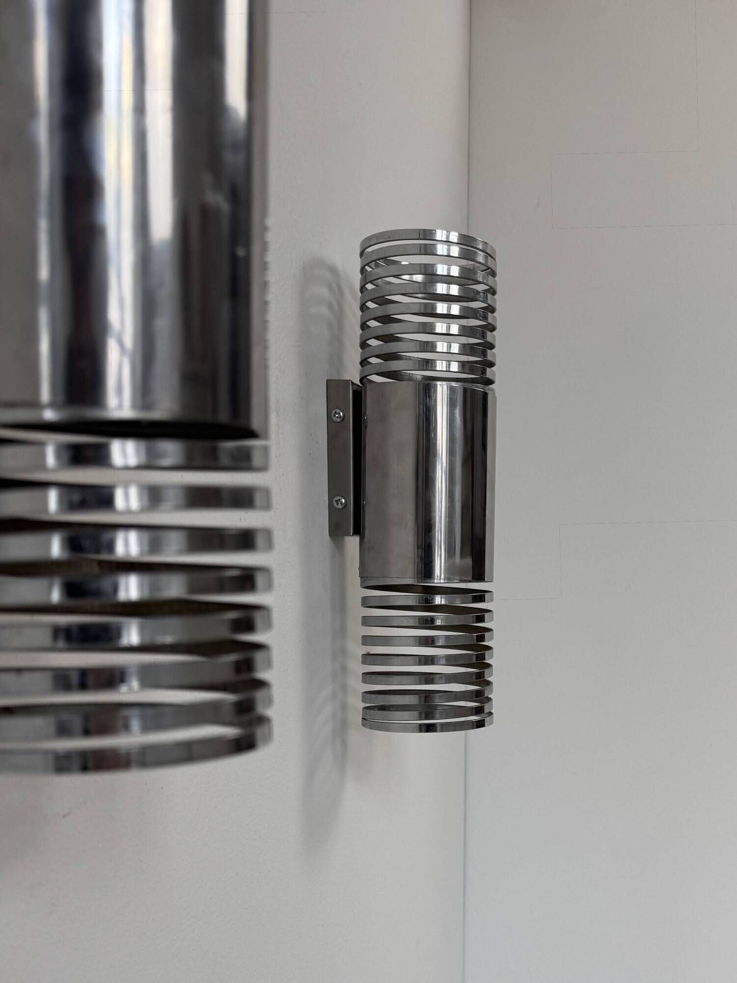Pair of vintage chrome metal wall lights, France 1970.