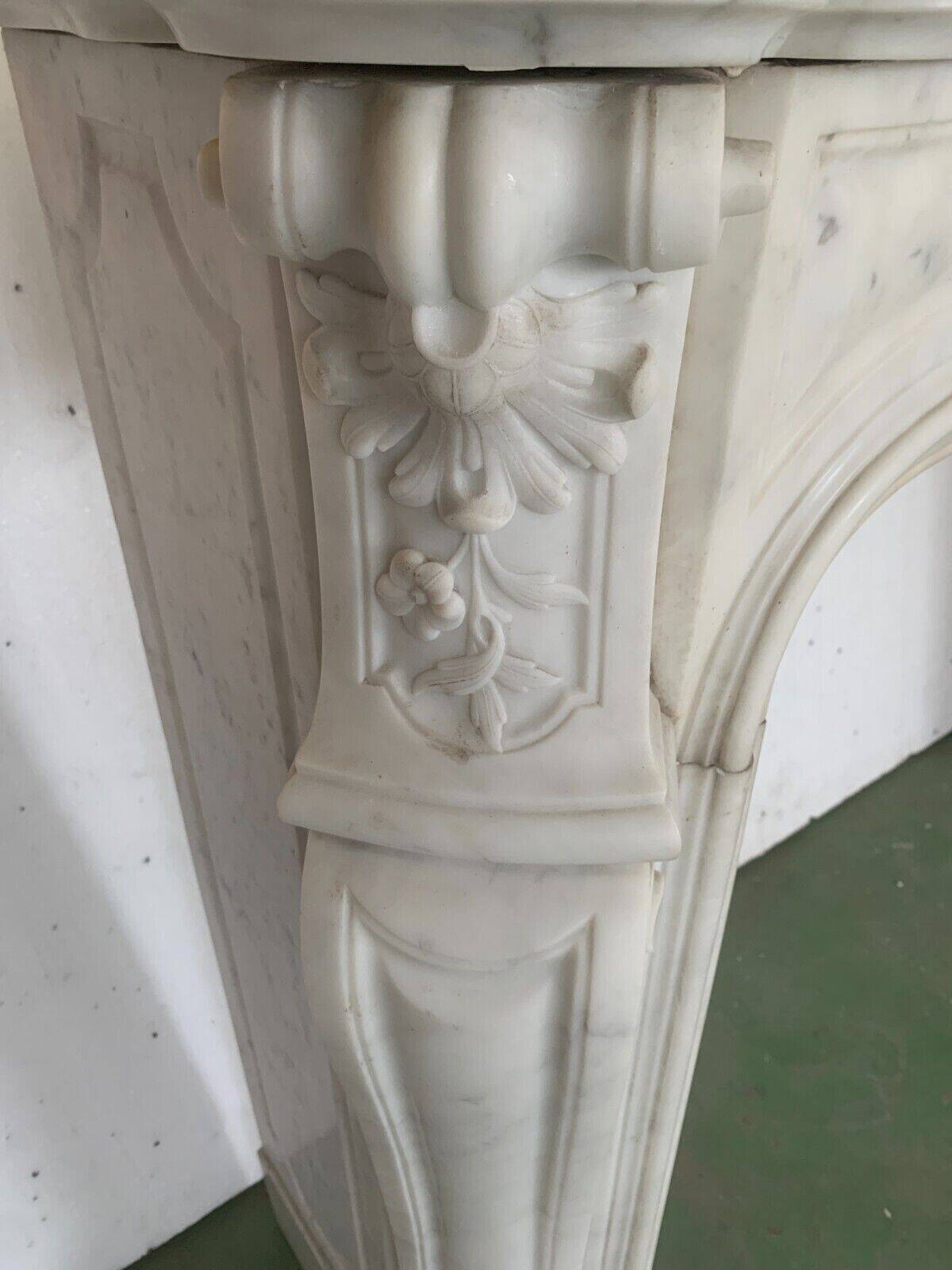 Louis XV style fireplace in white Carrara marble 19th century