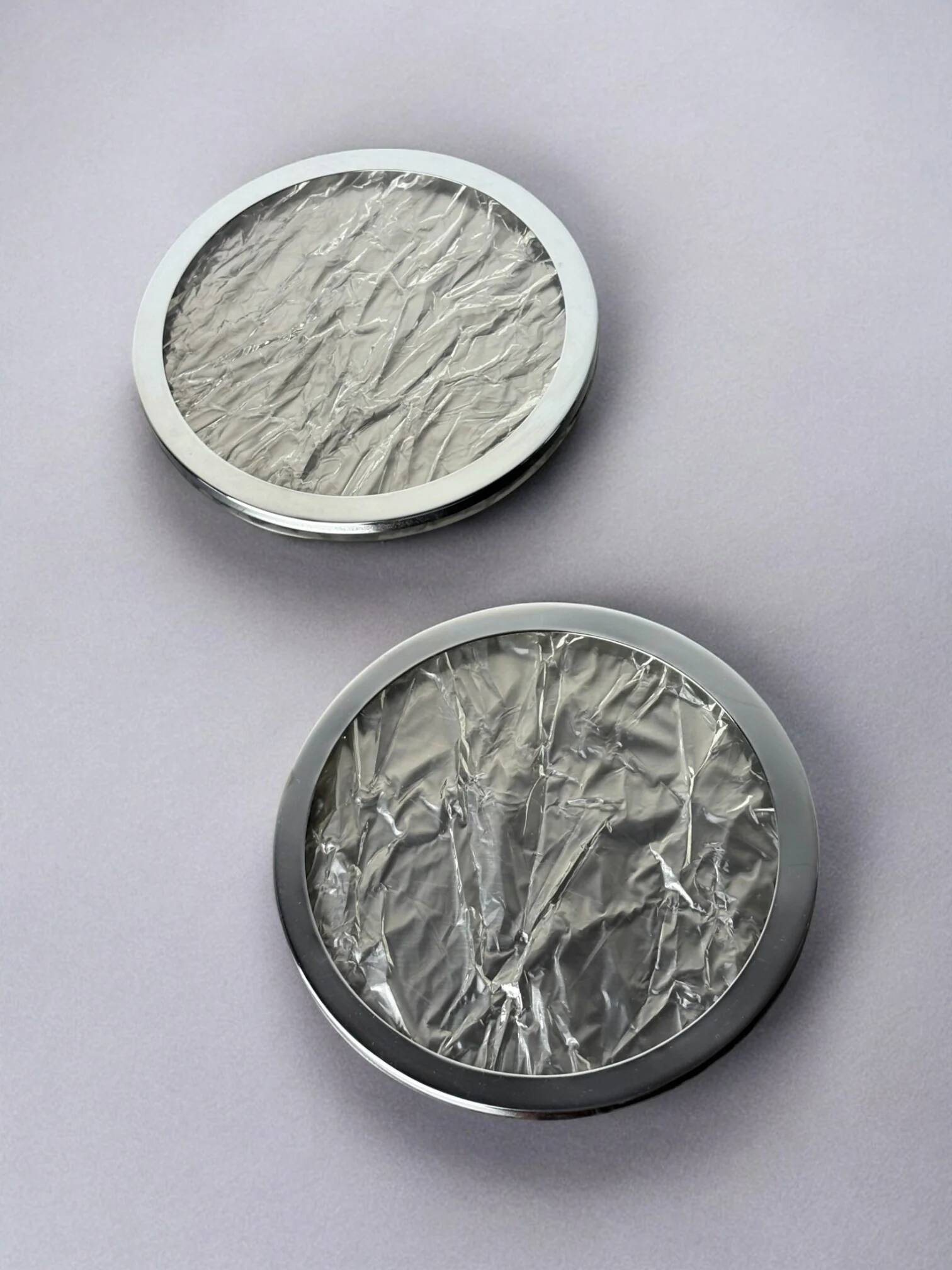 Willy Rizzo style ice effect lucite bottle coasters, set of 2, Italy, circa 1970s