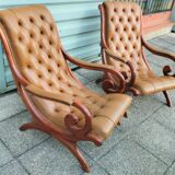 Paire de fauteuils type Chesterfield