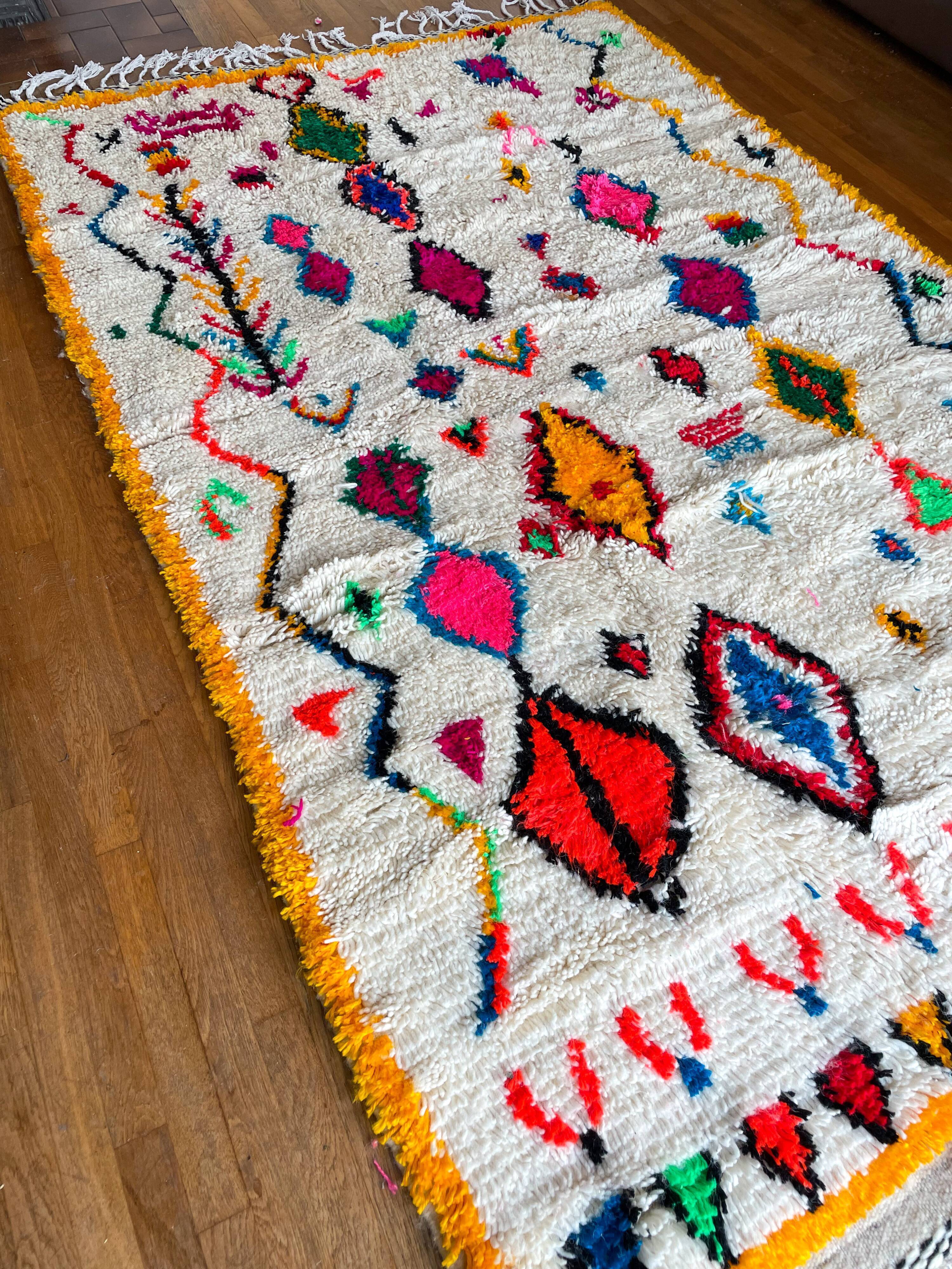 Berber carpet azimuth colored white with multicolored and fluorescent patterns