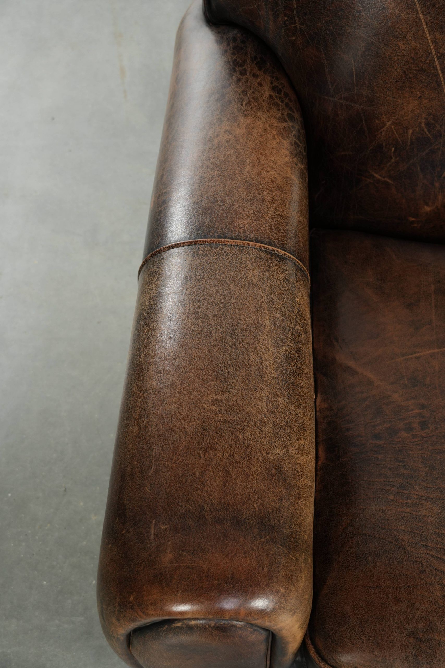 Set of two sheepskin Art Deco design armchairs with beautiful patina