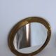Antique round brass mirror
