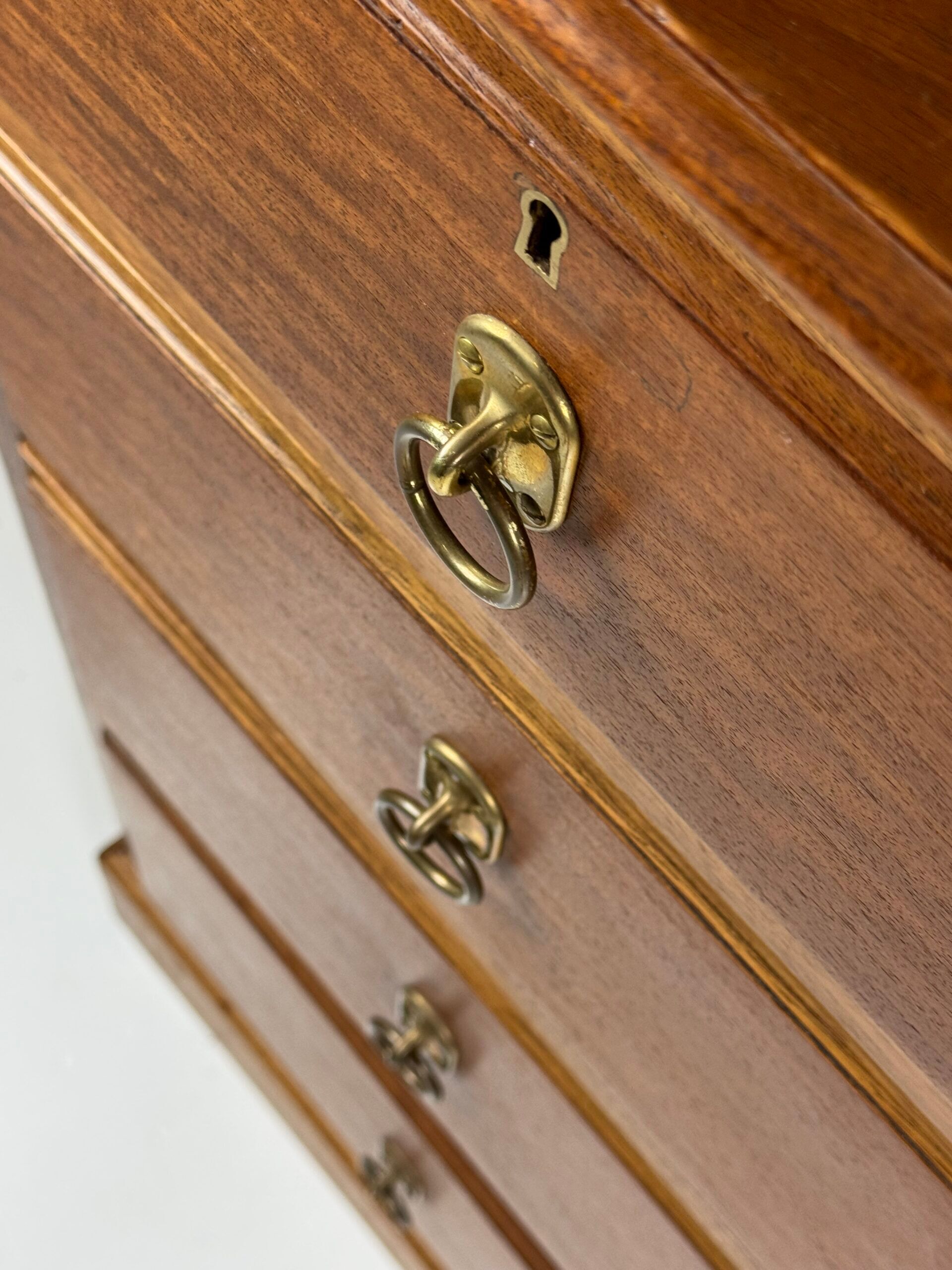 Harrods mahogany chest of drawers