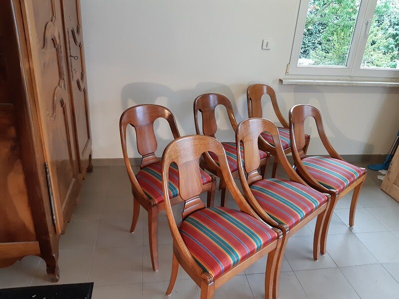 Gondola-style empire chairs