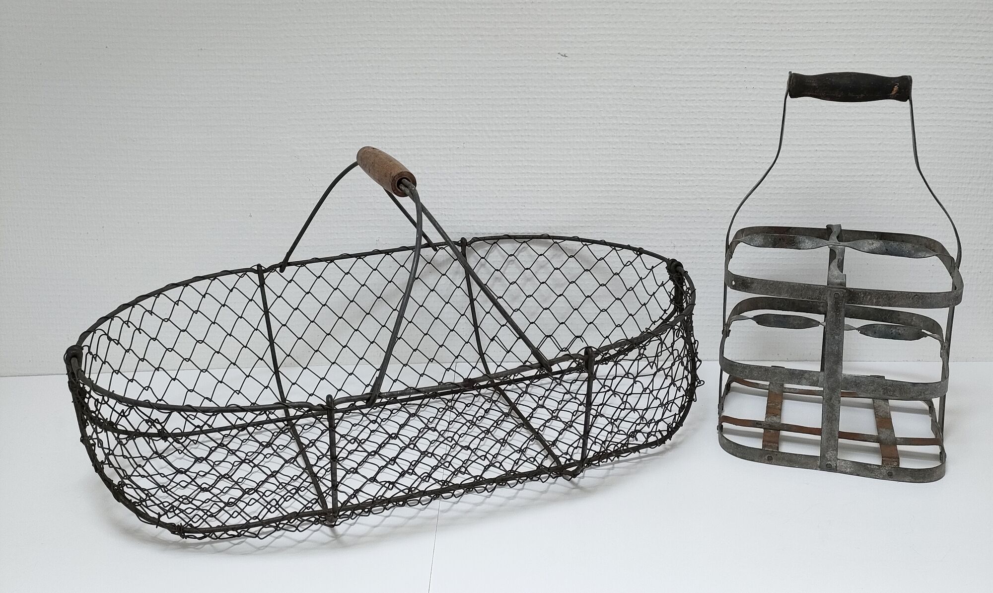 Two baskets metal and patinated wood early twentieth century